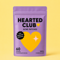 a purple bag with a yellow heart and black text