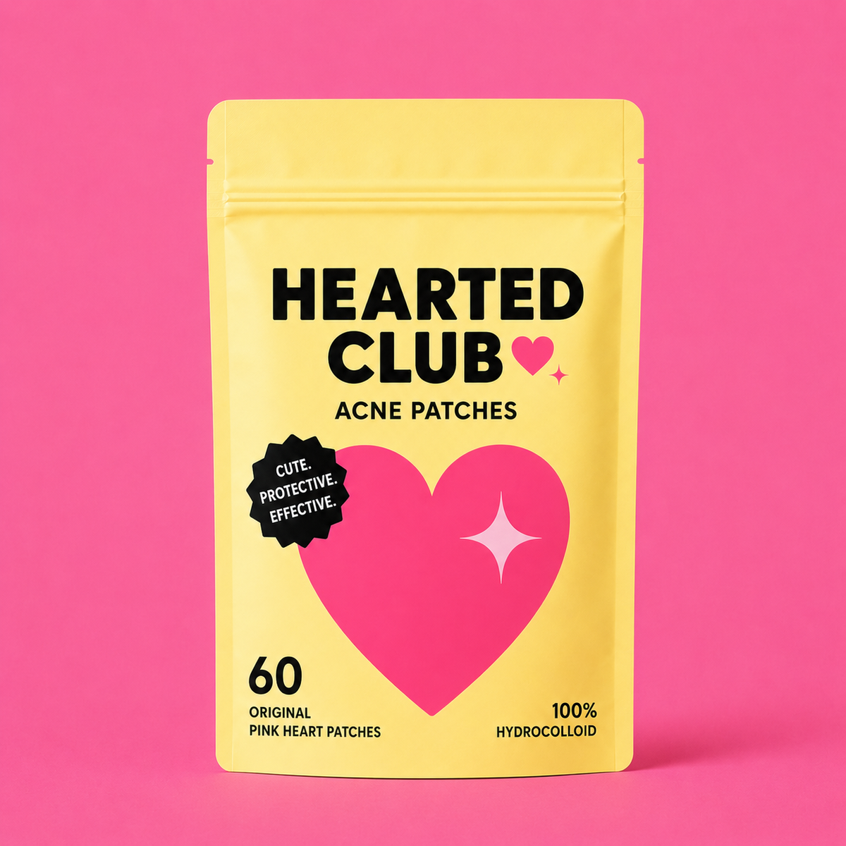 a yellow bag with a pink heart on it