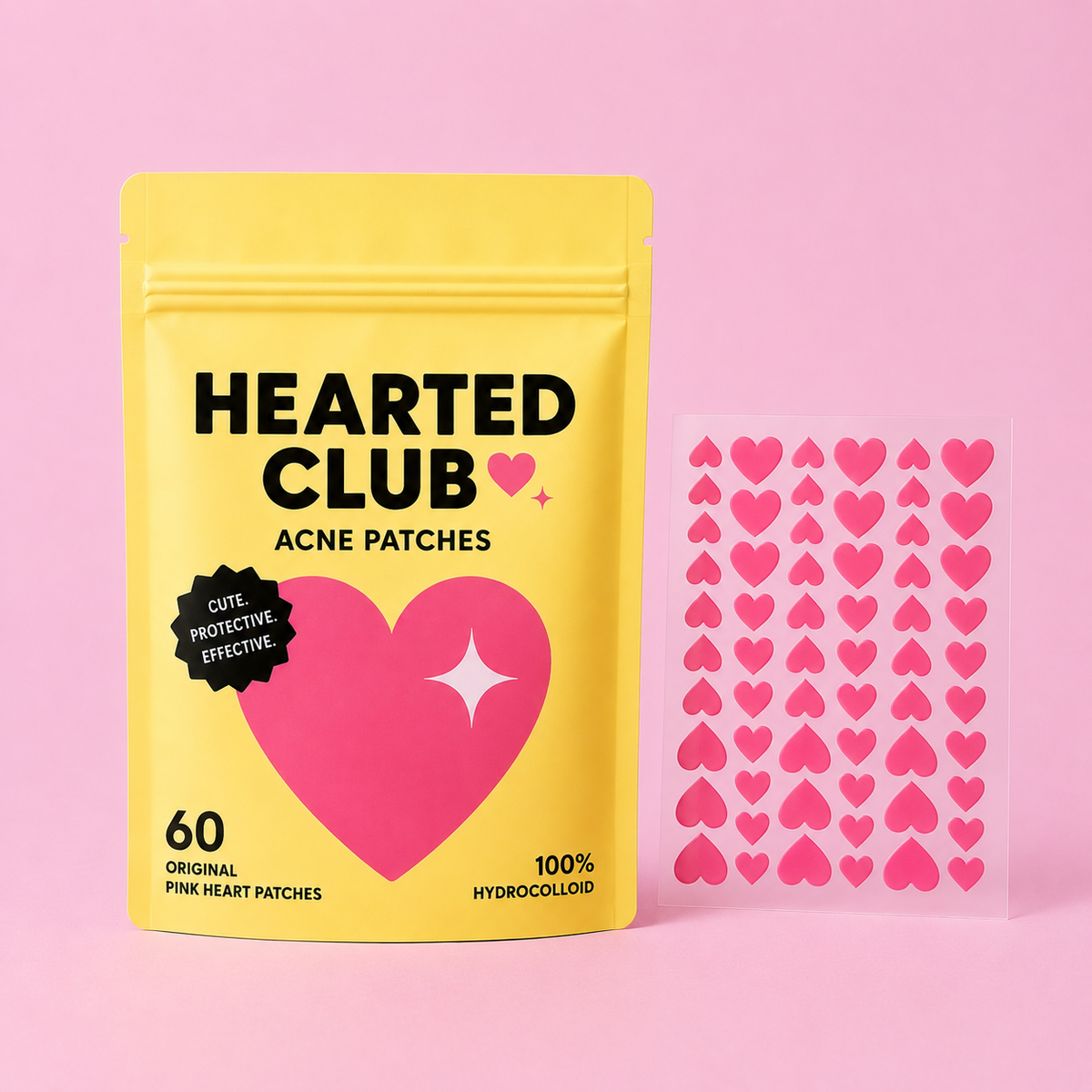 a yellow bag with black text and a pink heart patch