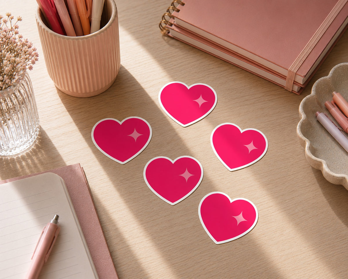 a group of pink hearts on a desk